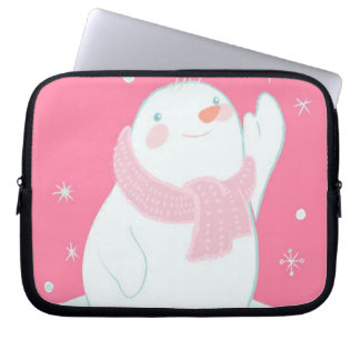 A snowman reaching for a falling snowflake laptop sleeve