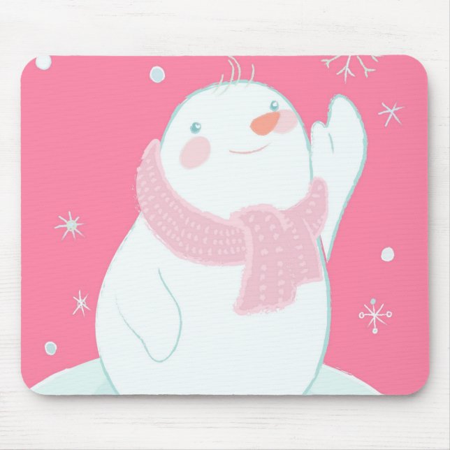 A snowman reaching for a falling snowflake mouse pad (Front)
