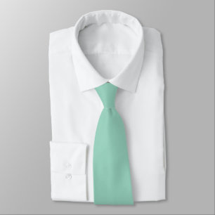 A soft mint muted solid colour. tie