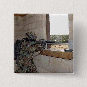 A soldier acts as an opposition force 15 cm square badge