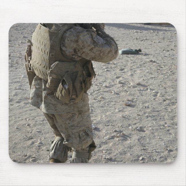 A soldier engages his target on a shooting rang mouse pad (Front)
