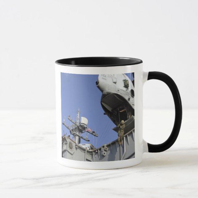A soldier fast-ropes mug (Right)