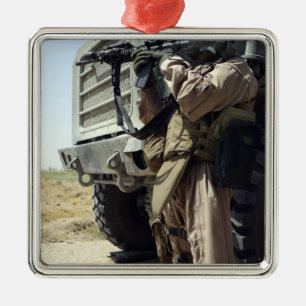 A soldier provides security for Marines Metal Tree Decoration