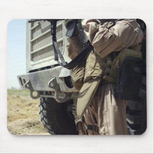 A soldier provides security for Marines Mouse Pad