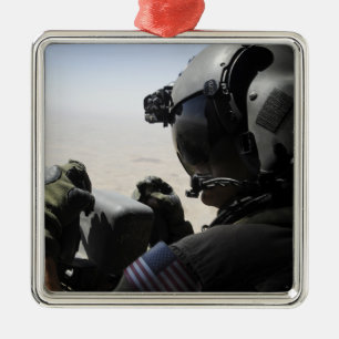 A soldier provides security metal tree decoration