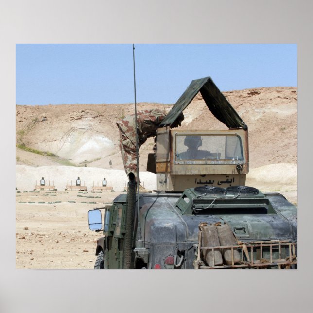 A soldiier instructs an Iraqi army soldier Poster (Front)
