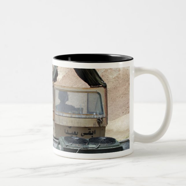 A soldiier instructs an Iraqi army soldier Two-Tone Coffee Mug (Right)
