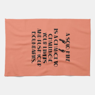 A solo hike is a chance to challenge your limits. tea towel
