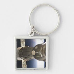 A Soyuz spacecraft backdropped by Earth Key Ring