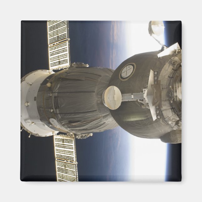 A Soyuz spacecraft backdropped by Earth Magnet (Front)