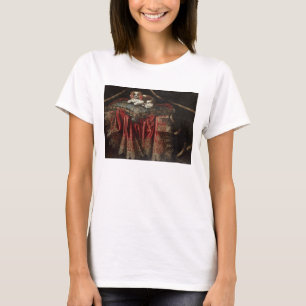 A spaniel seated on an embroidered cushion T-Shirt
