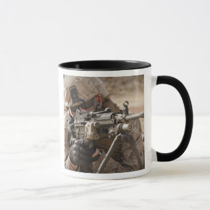A squad automatic weapon gunner provides securi mug