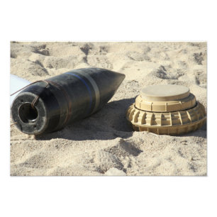 A static display of a converted ordnance shell photo print