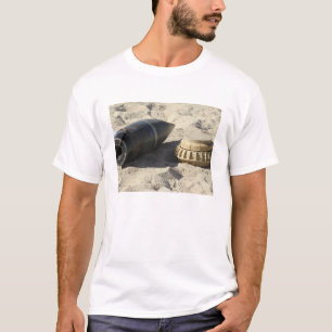 A static display of a converted ordnance shell T-Shirt