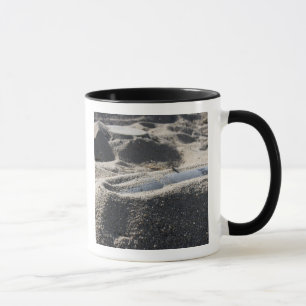 A static display of an ordnance shell mug