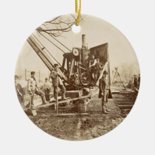 A steam crane in operation during the building of ceramic tree decoration