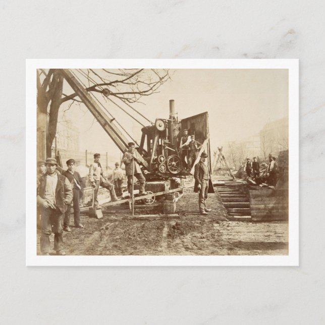 A steam crane in operation during the building of postcard (Front)