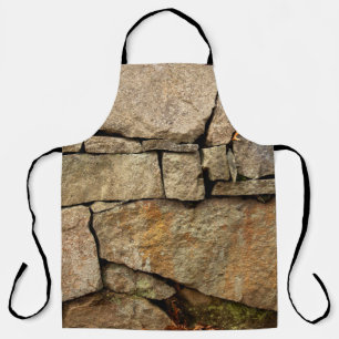 A stone wall made of cobblestones background textu apron