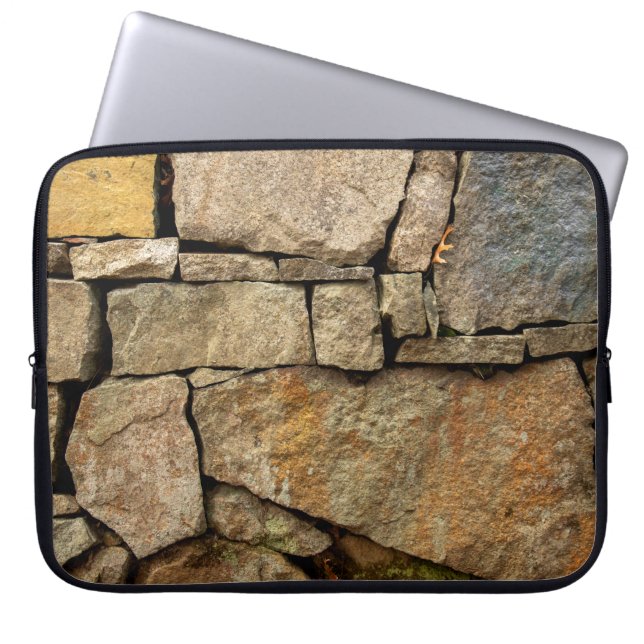 A stone wall made of cobblestones background textu laptop sleeve (Front)