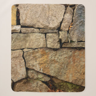 A stone wall made of cobblestones background textu sherpa blanket