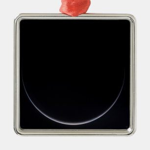 A sun-illuminated crescent of Earth Metal Tree Decoration