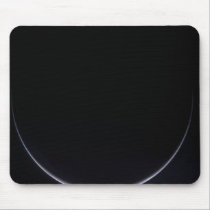 A sun-illuminated crescent of Earth Mouse Pad