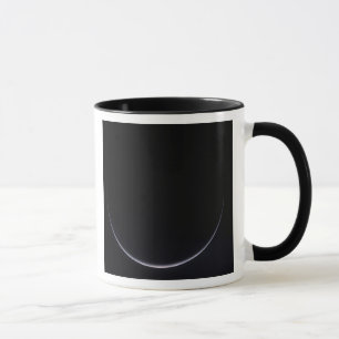 A sun-illuminated crescent of Earth Mug