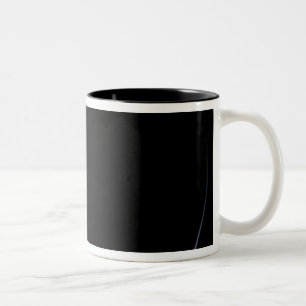 A sun-illuminated crescent of Earth Two-Tone Coffee Mug