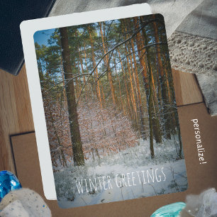 A sunny winter day in the pine forest holiday card
