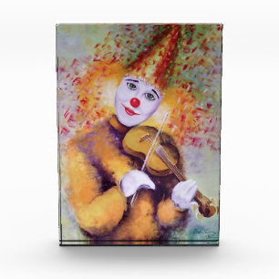 A sweet clown playing the violin photo block