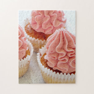 A Sweet Treat Cupcake with Pink Frosting Jigsaw Puzzle