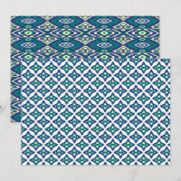 A symmetrical blue and white rug with intricate mo