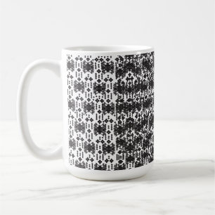 A symmetrical monochrome design featuring intricat coffee mug