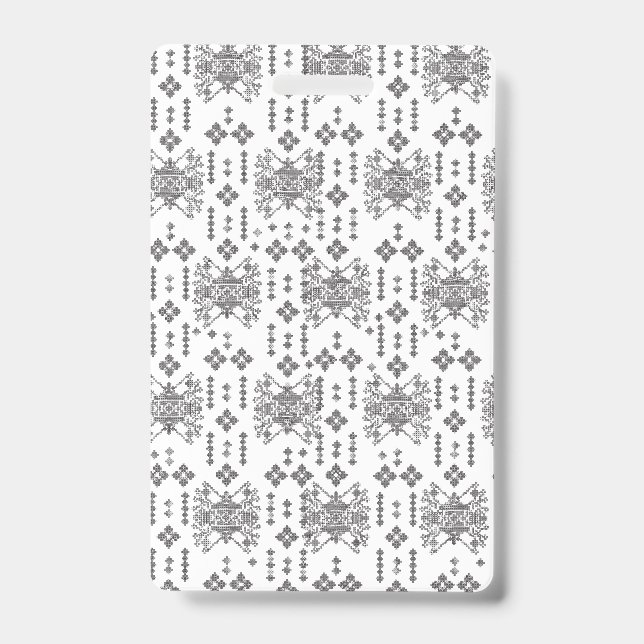 A symmetrical monochrome design featuring intricat ID badge (Front)