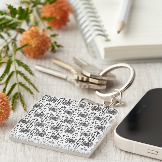 A symmetrical monochrome design featuring intricat key ring (Front Right)