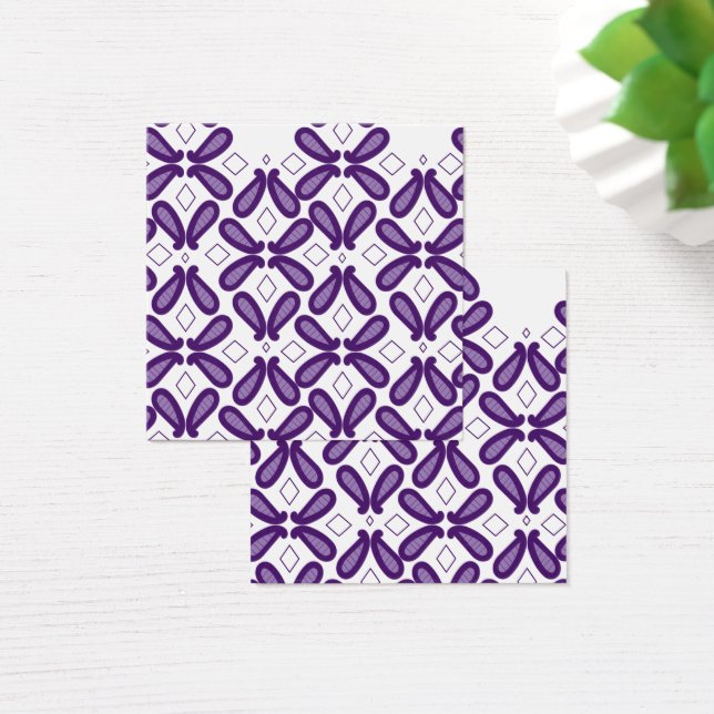A symmetrical pattern featuring white and purple m (Desk)