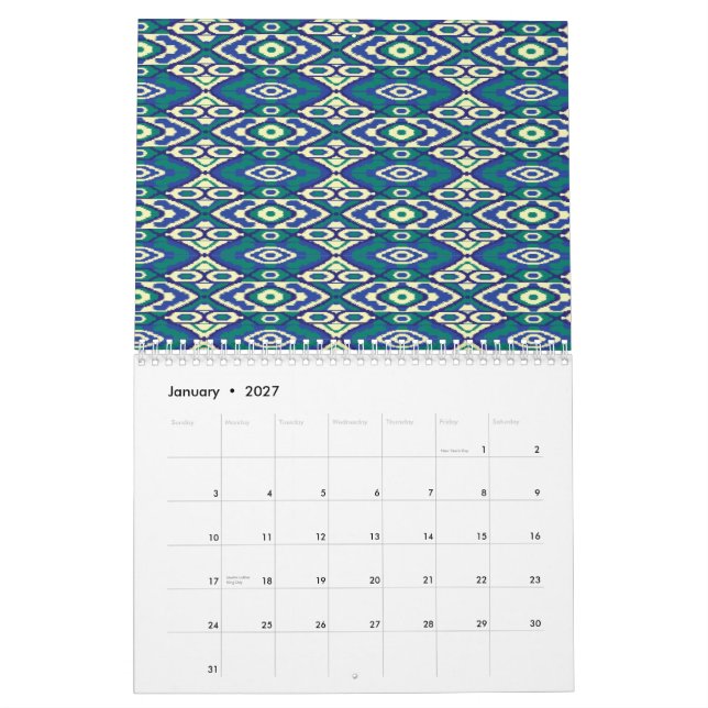 A symmetrical pattern of blue motifs on a textile  calendar (Jan 2027)