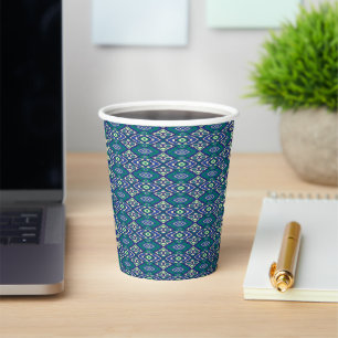 A symmetrical pattern of blue motifs on a textile  paper cups