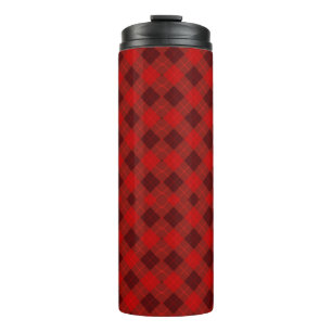 A tall travel mug with a vibrant red plaid pattern