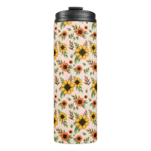 A tall white tumbler with vibrant sunflower
