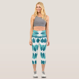 A teal & white trendy fabric pattern design capri leggings