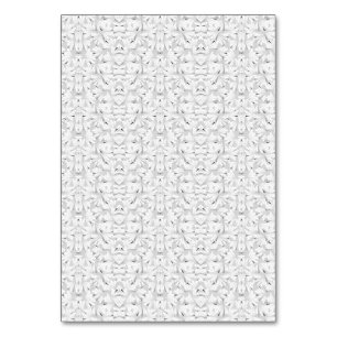 A textured pattern featuring white and grey hues,  table number