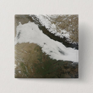 A thick bank of low clouds 15 cm square badge