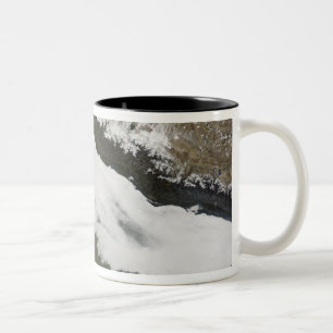 A thick bank of low clouds Two-Tone coffee mug