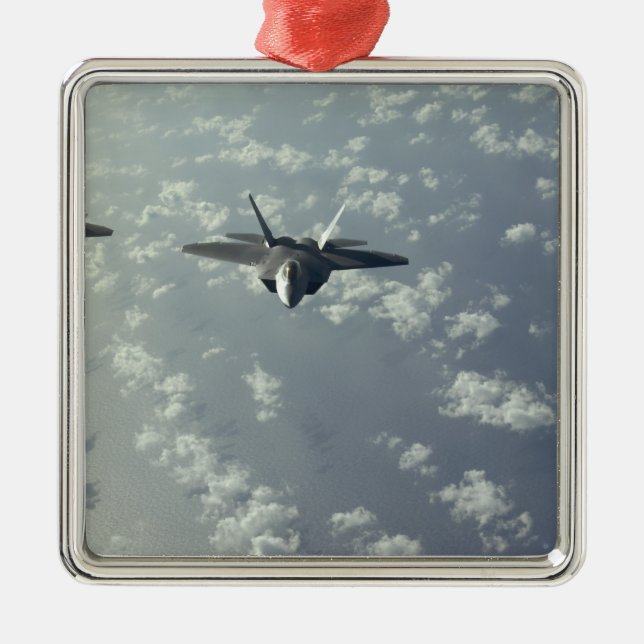 A three-ship formation of F-22 Raptors Metal Ornament (Front)