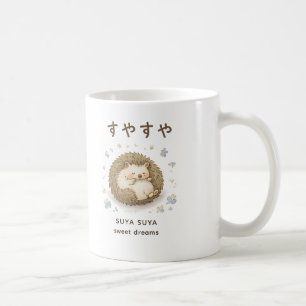 A tiny hedgehog enjoying a peaceful nap coffee mug