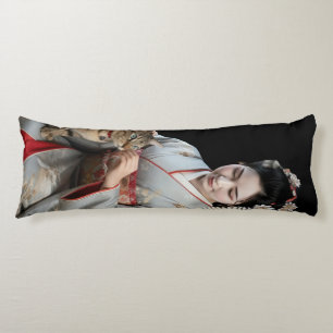 A Tortoiseshell Cat Resting Paws on a Maiko Body Cushion