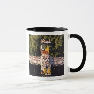 A totem pole In Vancouver, Canada. Mug