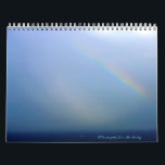 A Touch of the Sun ~ II Calendar<br><div class="desc">Enjoy many scenes from nature, including a rainbow over the ocean, nature's gorgeous flowers and a butterfly and hummingbird. Reflect on Christmas times together, and included also is a special capture from our Nation's Capital. Please contact me for any prints from the pictures. Thanks for stopping by!</div>