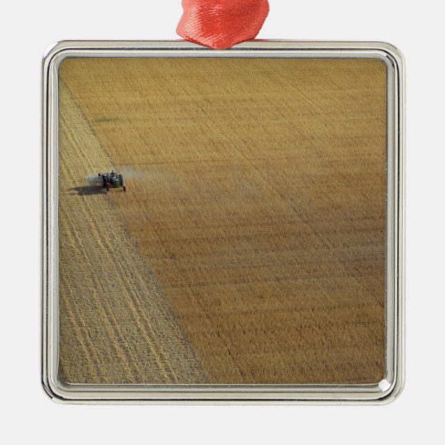 A tractor harvesting metal tree decoration (Front)